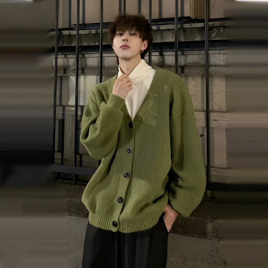 Men's solid colour V-neck knit cardigan in a loose fit, shown in army green.