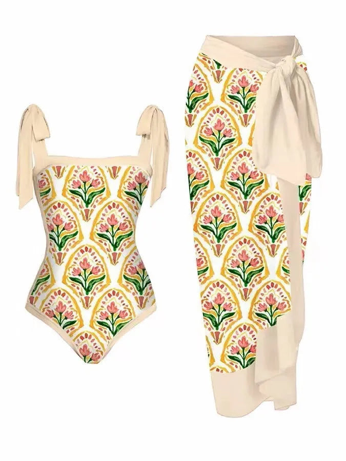 Women's two-piece floral printed polyester swimsuit with matching hip skirt in conservative style