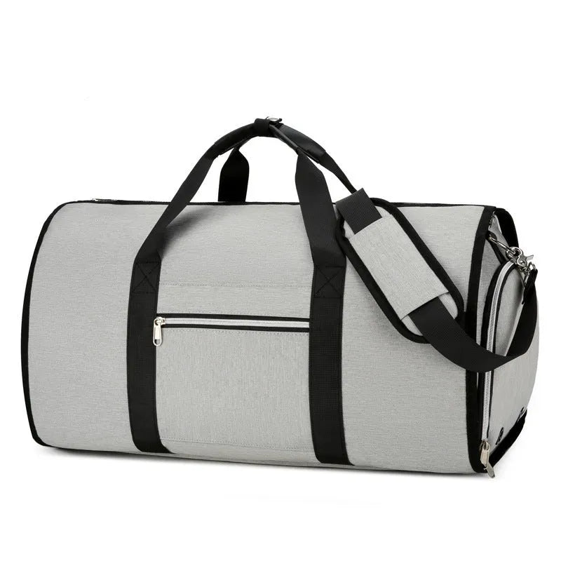 Grey Oxford cloth sports and business bag with expansion feature and dry wet separation compartments.