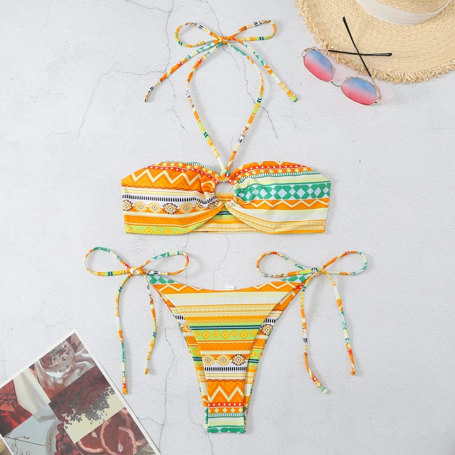 Women's halter-neck bikini swimsuit with split briefs in blue, yellow, green stripe orange grid, and green stripe red plaid colours