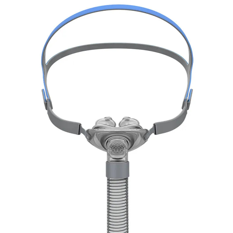 Ventilator nasal pillow mask accessory kit with silicone cushions and plastic headband.