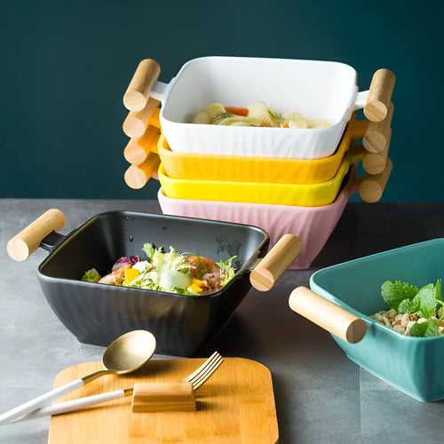 Porcelain ceramic bowl with lid in irregular shape design, shown in available colour options.