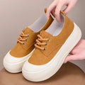 Women's camel suede platform loafers with 4cm heel, round toe, and front lace-up on a rubber sole.
