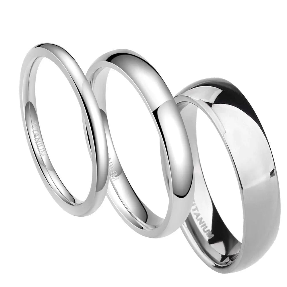 Polished silver titanium steel unisex ring shown in 2mm, 4mm, and 6mm width options.