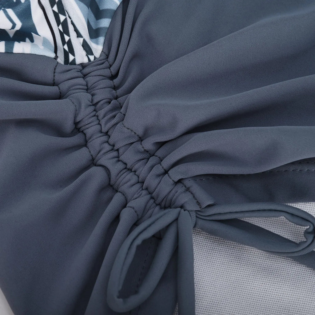 Women's bikini swimsuit in picture colour, shown as a two-piece without padding or underwire.