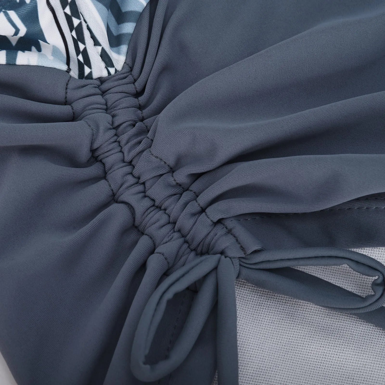 Women's bikini swimsuit in picture colour, shown as a two-piece without padding or underwire.