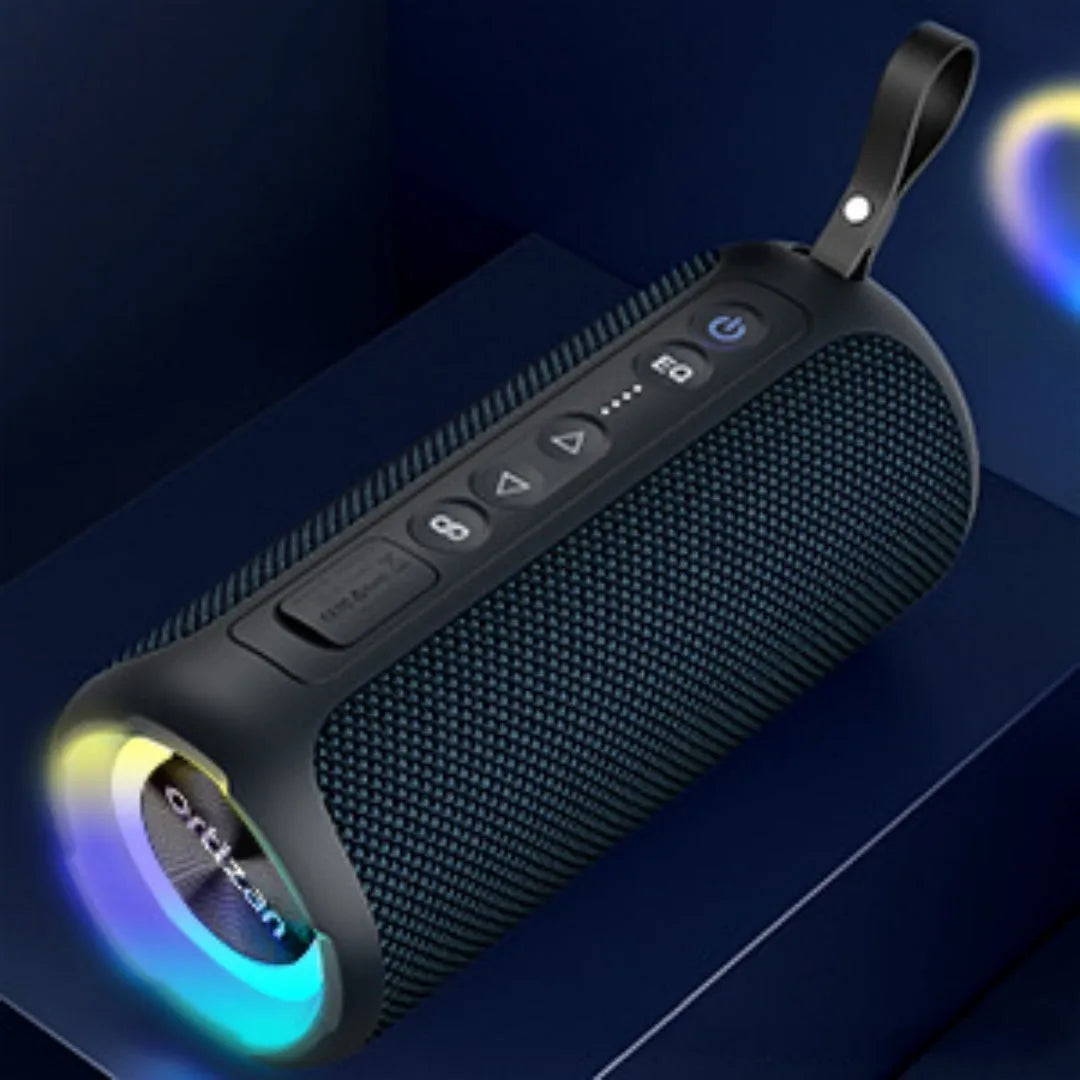 Black and blue fabric Bluetooth speaker with RGB lighting showing waterproof outdoor design