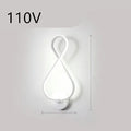 Nordic style LED wall lamp with a silicone shade mounted on a bedroom wall