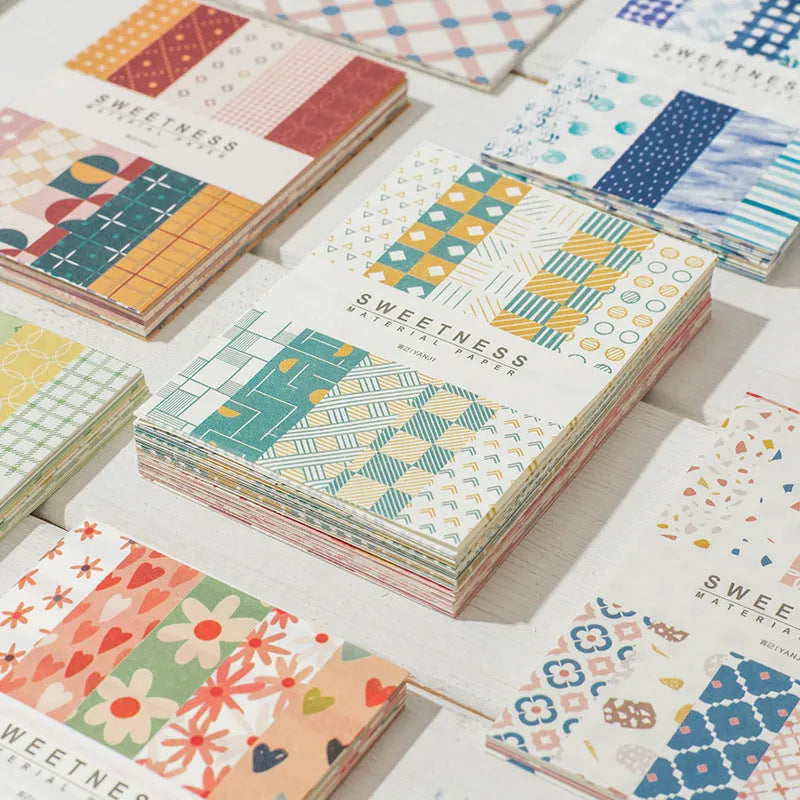 Pack of 50 retro sweet dessert themed note papers in ten pastel colours, each 56mm by 83mm.