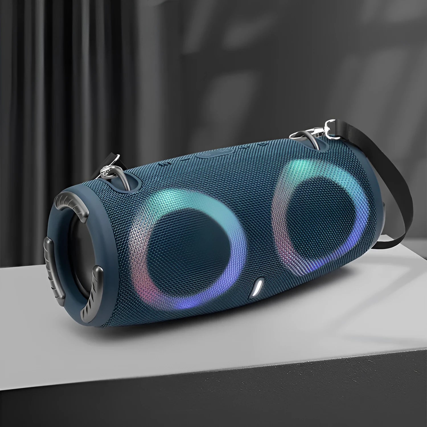 War Drum portable Bluetooth speaker with RGB coloured lights in outdoor setting