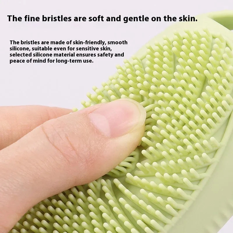 Silicone bath brush storage bottle in a selection of colours including pink, orange, and light grey.