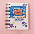 Astronaut flipped portable pocket notebook showing space-themed cover designs at 10.5 by 8 cm size