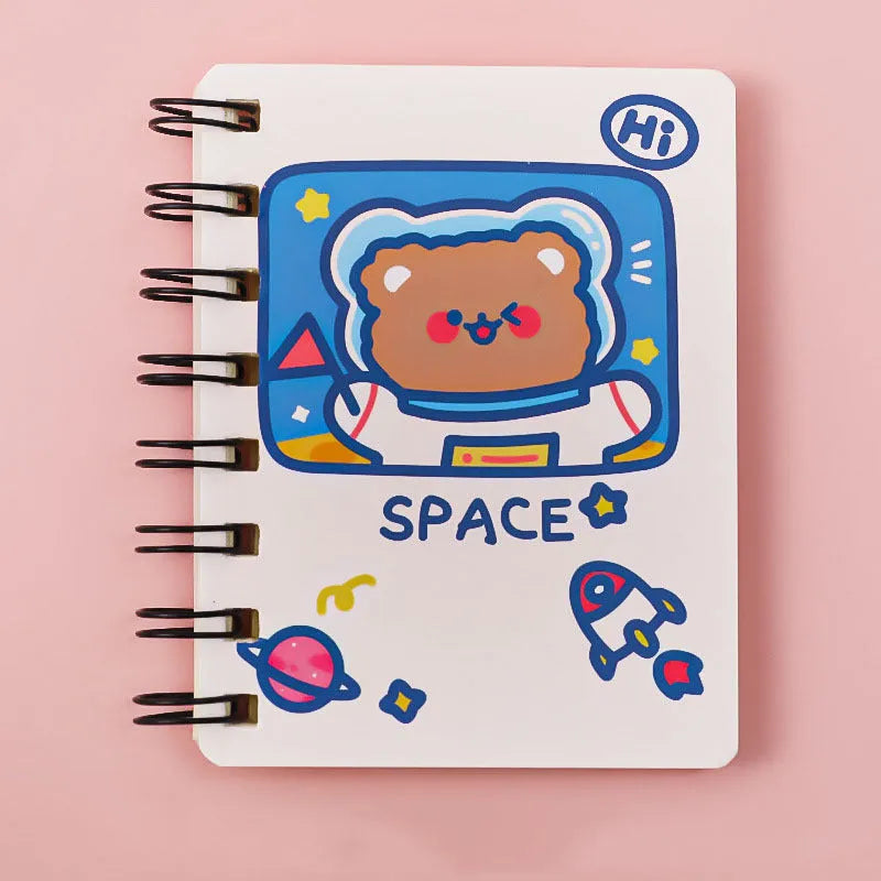Astronaut flipped portable pocket notebook showing space-themed cover designs at 10.5 by 8 cm size