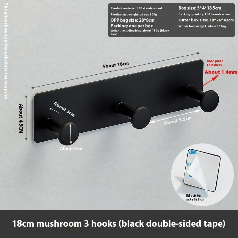 Iron adhesive wall hook with multiple arms on shower door, white double-sided tape visible