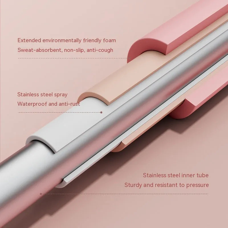 Children's adjustable open back stick in pink colour showing length adjustment mechanism