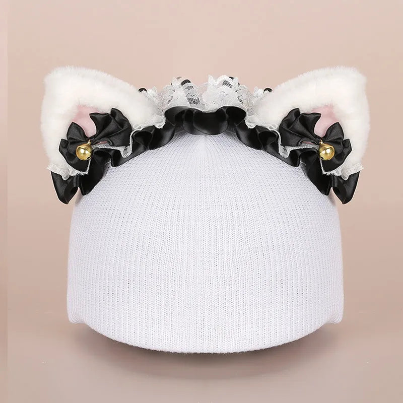 Cute plush cartoon animal character hat designed to decorate a standard ski helmet.