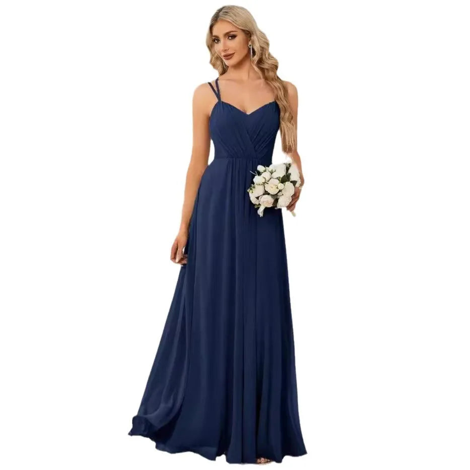 Women's sleeveless pleated A-line dress in light green with sling neckline for banquet occasions