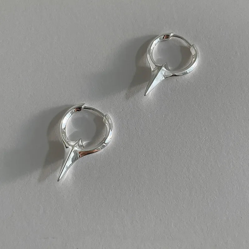 Geometric star shaped women's ear clips with electroplated copper white gold finish in platinum colour