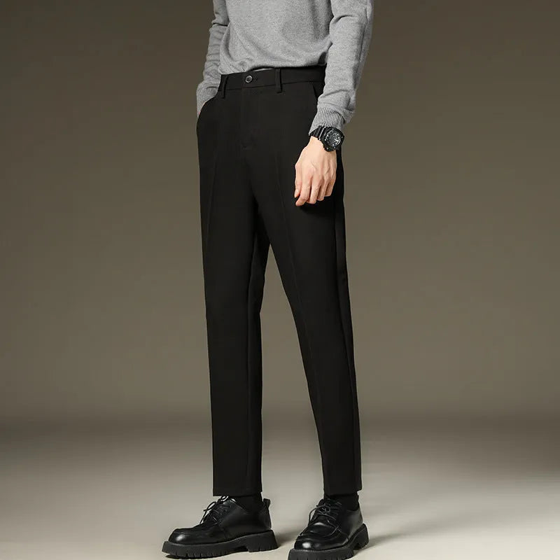 Men's black straight-leg fleece padded suit pants with wool lining, zipper fly, and mid-waist fit
