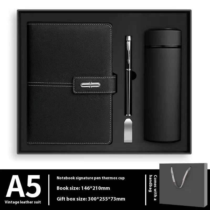Custom A5 notebook with imitation leather cover in Business Black showing wood-free paper interior pages