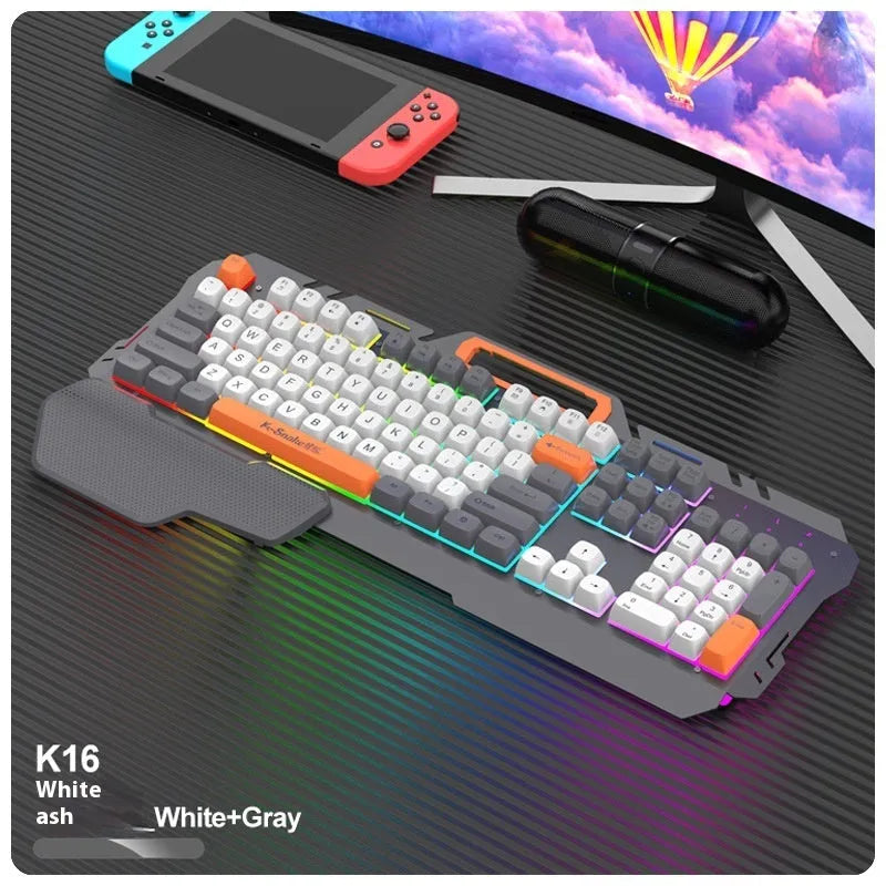 Blue and grey wired gaming keyboard and mouse set with backlit keys on desk