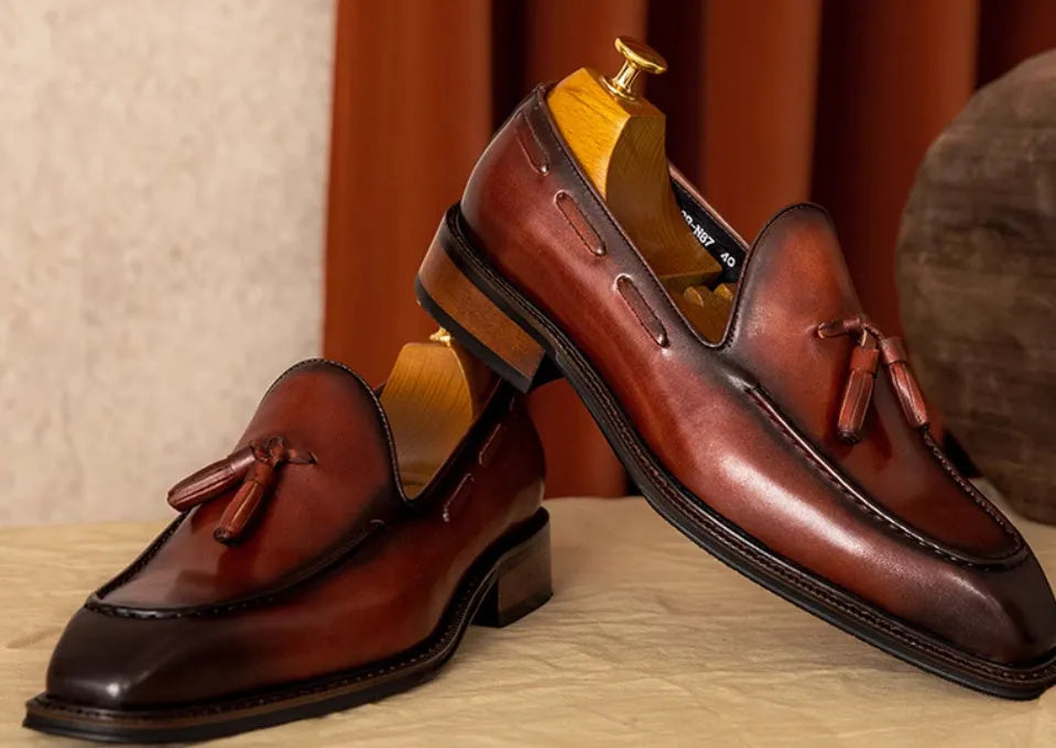Men's black genuine leather loafers with fringed design and rubber soles