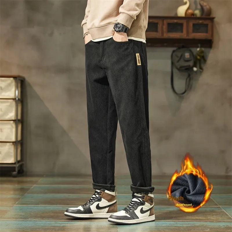 Corduroy men's casual straight-leg trousers in solid colour with mid-waist rise and zipper fly