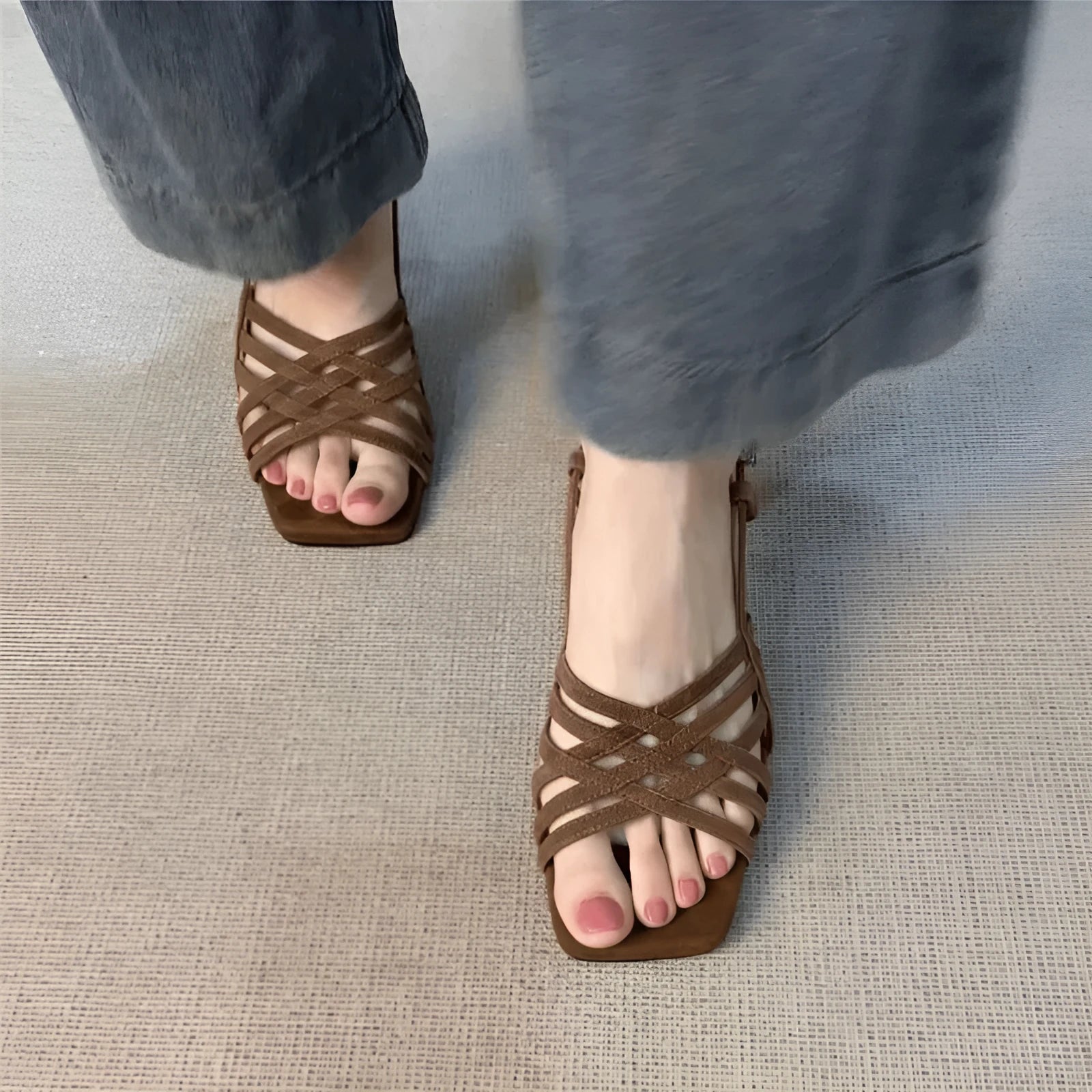 Women's light brown retro ankle-strap sandals with thin cross straps and a square toe on a mid heel.