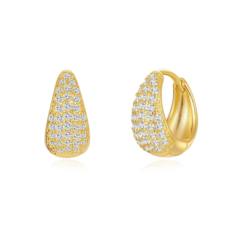 Geometric brass earclip earrings with round elements in golden and gold finishes