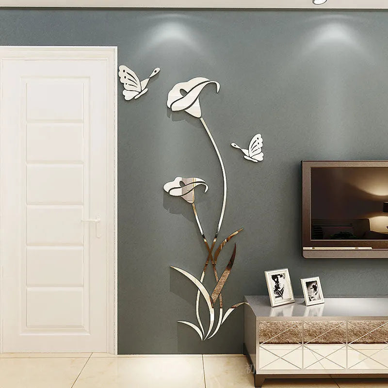 3D acrylic lily wall sticker in silver colour, showing its raised silhouette against a plain wall.