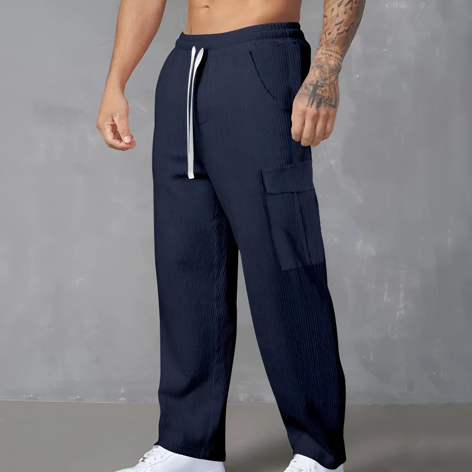 Men's straight-leg corduroy cargo trousers in brick red with a drawstring waist