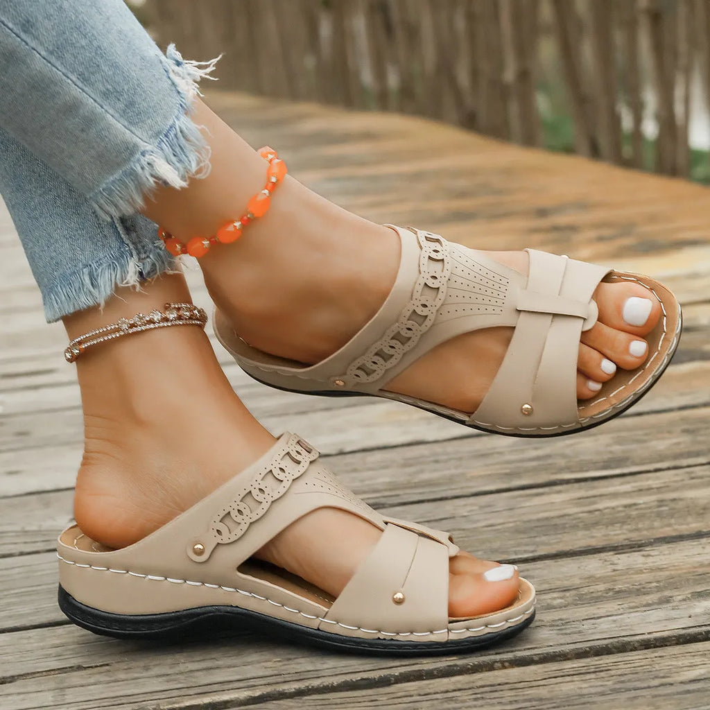 Casual Roman style slope heel slippers with a fish mouth toe holder, shown in available colours.