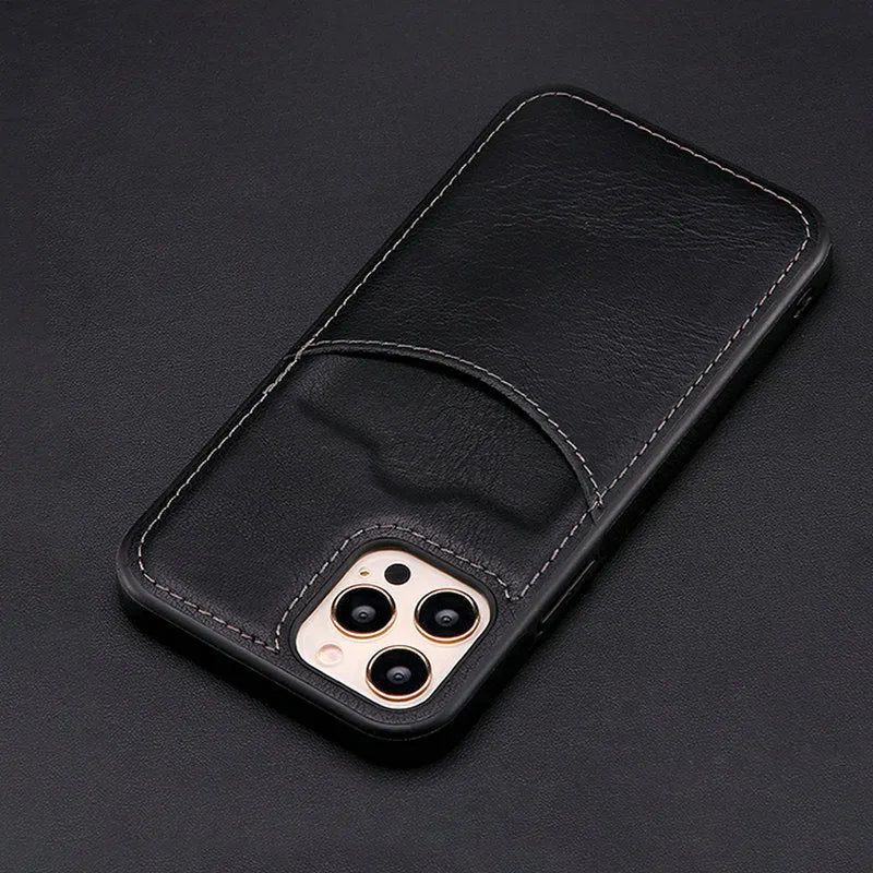Dark blue PU leather protective case for iPhone on a table.