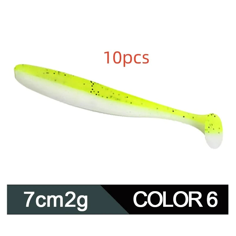 Soft plastic T-tail fishing lure in two-tone mandarin fish pattern, 7cm long.