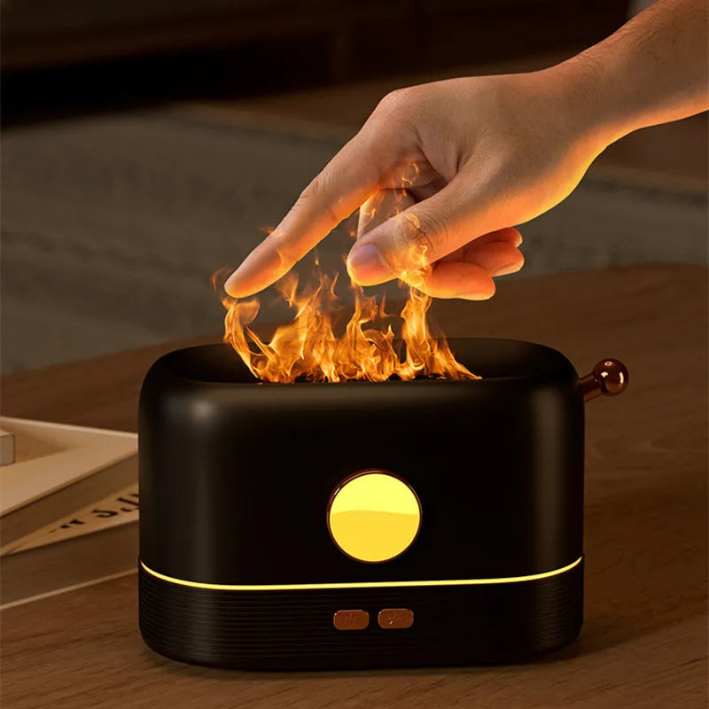 Black USB flame humidifier with 200ml water tank on wooden desktop with mist and simulated flame effect