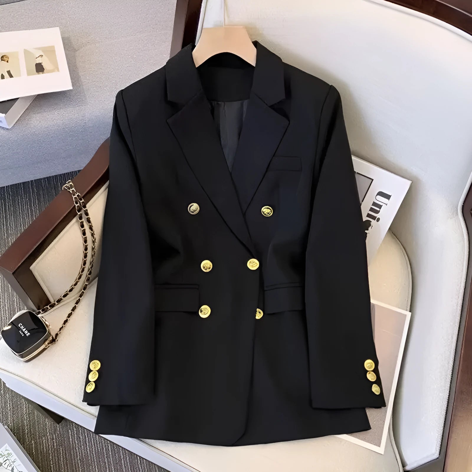 Women's loose fit polyester blouse in black colour with regular sleeves and slimming silhouette
