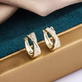Geometric copper earrings with 14K yellow gold plating and zircon crystals