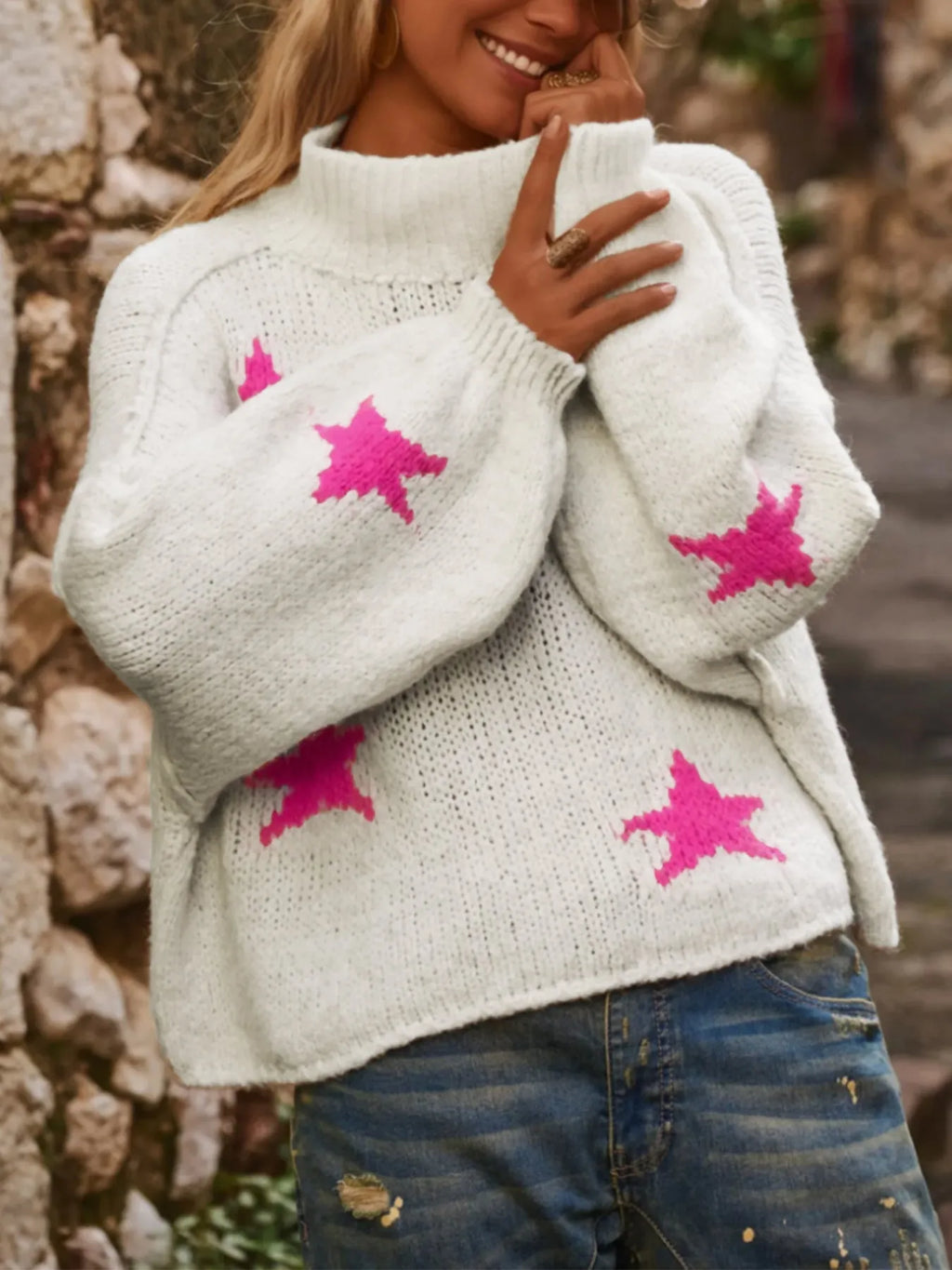 White women's loose turtleneck pullover sweater with five-pointed star pattern