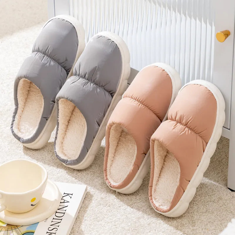 Down cotton couple slippers with artificial leather upper and non-slip rubber soles in multiple colour options