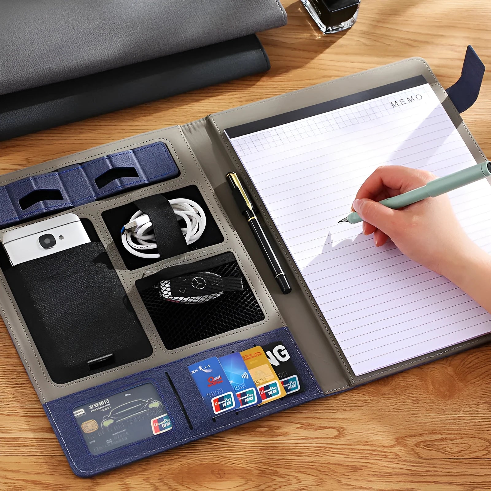 Black leather A4 business folder with pen holder and notepad accessories