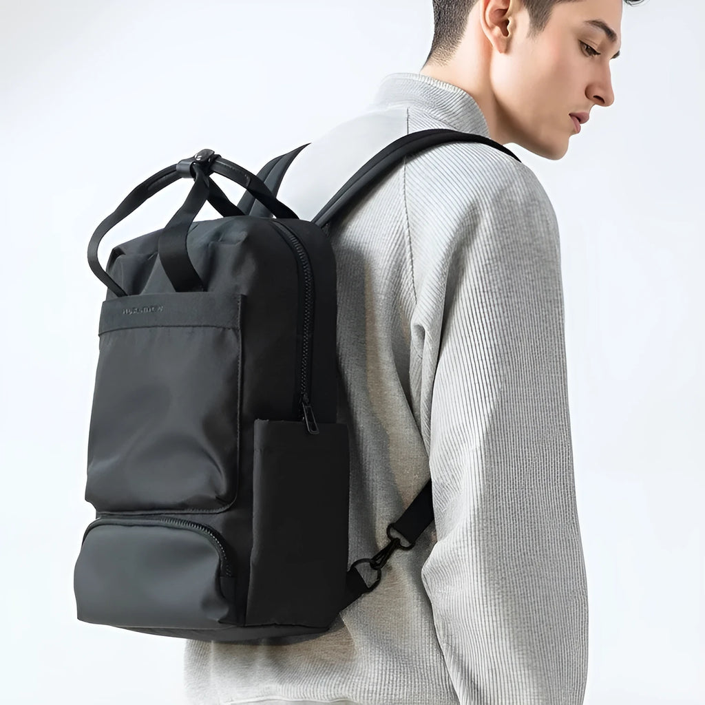 Elegant black Oxford cloth computer backpack with 20-35L capacity shown front view
