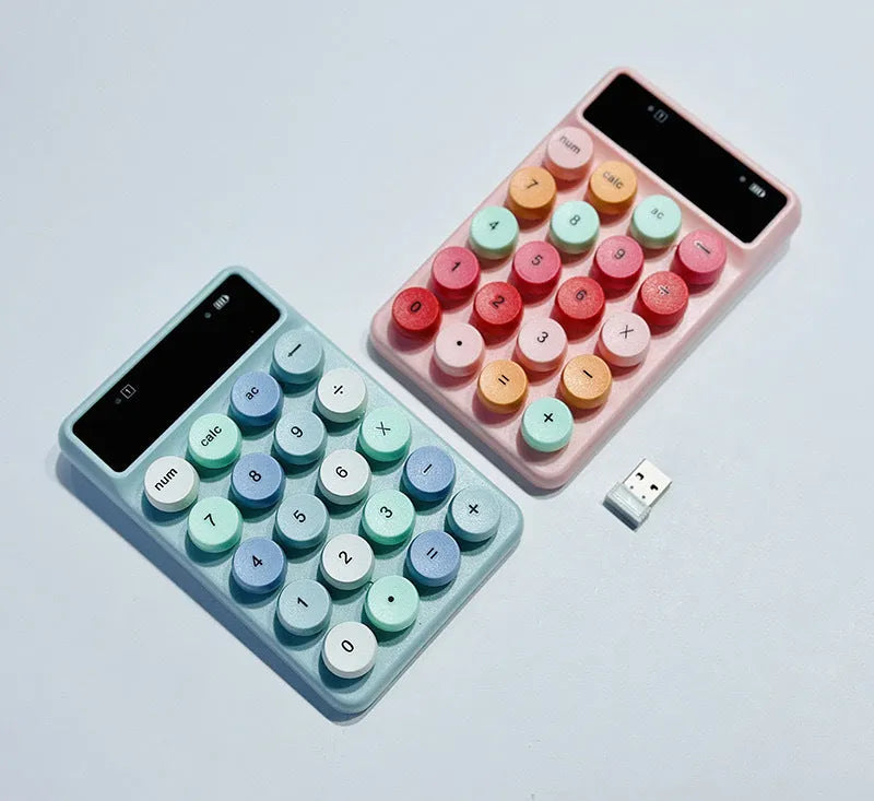 Mini portable wireless digital keyboard in macaron colour options on white background