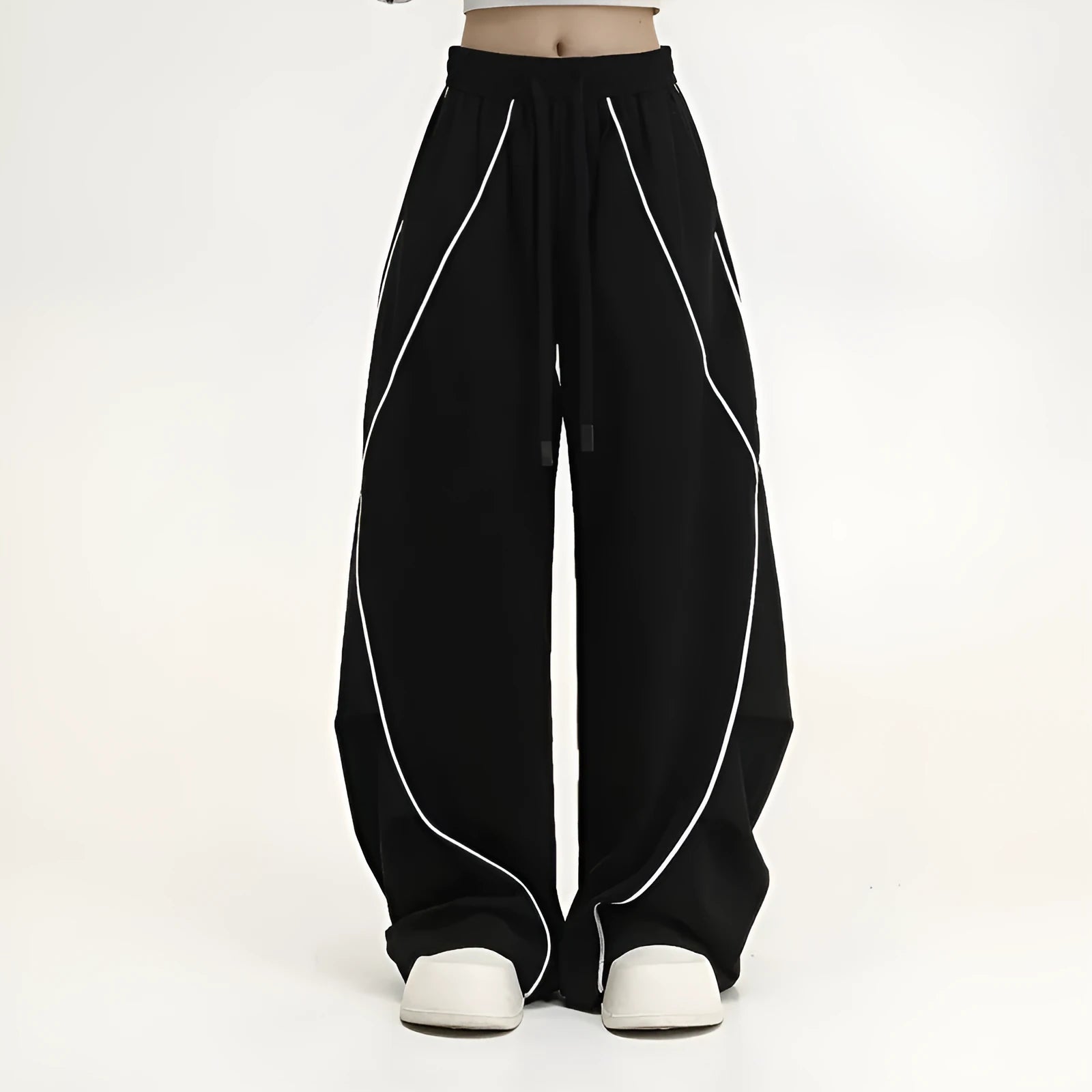 Black striped pleated hip hop wide-leg trousers with mid waist on mannequin