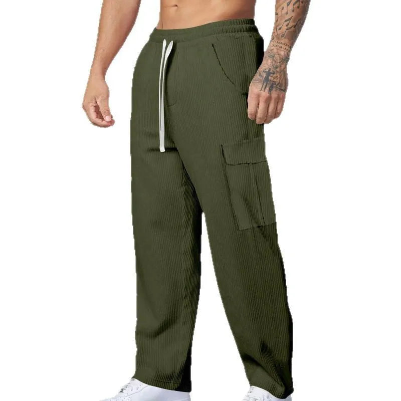 Men's straight-leg corduroy cargo trousers in brick red with a drawstring waist