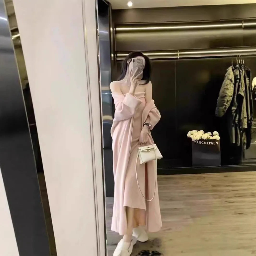 Women's grey knitted cardigan dress and coat suit set with flocking pattern detail.