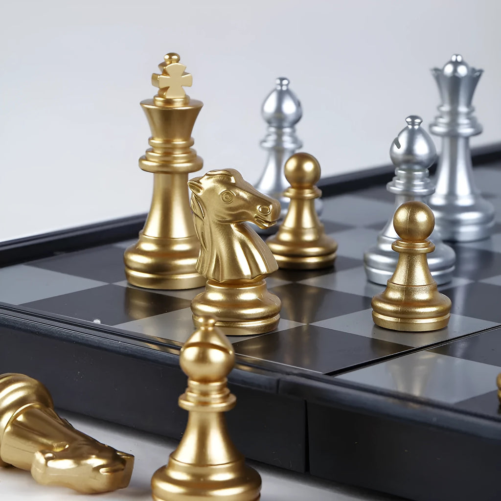 Portable folding ABS chessboard 32cm for students and children, open on a flat surface