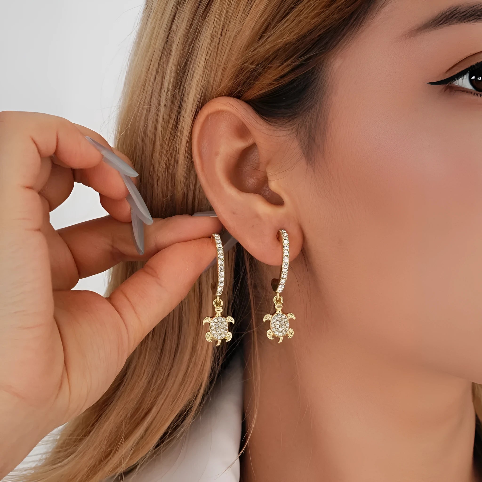 Set of four ladies geometric irregular shaped light luxury retro earrings in gold and silver tone finish