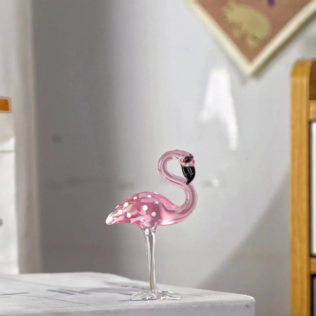 Pink crystal flamingo decorative ornament on tabletop with modern simplicity style