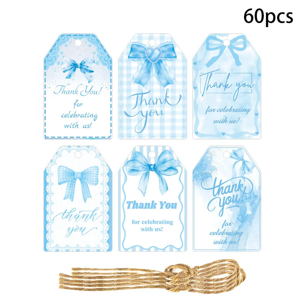 Set of 60 bowknot-shaped paper gift tags with natural hemp rope for birthday parties in three styles.