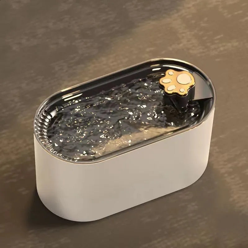 Berlin Blue 3-litre automatic pet water fountain with filter and LED light on a wooden floor.